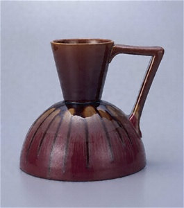 Reddish vase with a handle