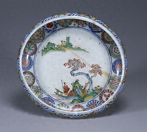 Bowl in the Shape of a Gong with Boating Figures in a Landscape