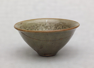 Bowl Celadon glaze with stamped arabesque design