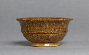 Bowl Marbled ware, with yellow glaze.