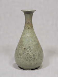 Vase Celadon glaze with dragon design in inlay and red pigment