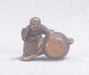 Wood Netsuke., Daikoku (one of the Seven Gods of Good Fortune).