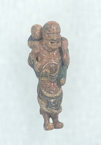 Netsuke, Taoist immortal carrying a child on his back design
