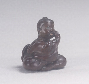 Toggle ("Netsuke") in the Shape of a Boy with a Mask