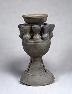 Footed Jar with Smaller Vessels