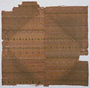 Fragment of Wrapping Cloth Brocade; with circle and flower design on purple ground