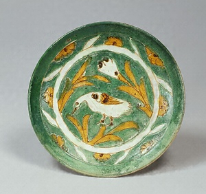 Dish Three-color glaze with carved small bird design
