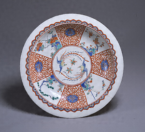 Large Dish with Paired Phoenixes, a Pine Tree, Bamboo, a Plum Tree, and Peonies Porcelain with overglaze enamel