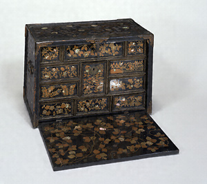 Cabinet Design of flowers and birds in maki-e laquer and mother-of-pearl inlay.