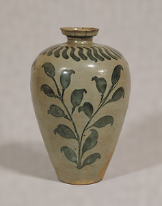 Vase Celadon glaze with plant design in underglaze iron