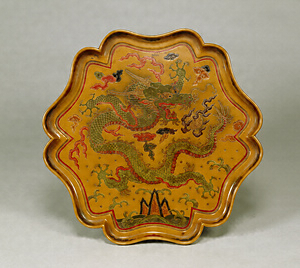 Lobed Tray with a Dragon among Surging Waves Lacquer coating inlaid with lacquer and gold
