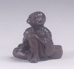 Toggle (&quot;Netsuke&quot;) in the Shape of a Grass Cutter