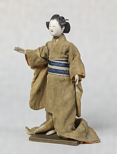 Costumed Doll of a Woman