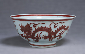 Bowl Design of dragon in red glaze.
