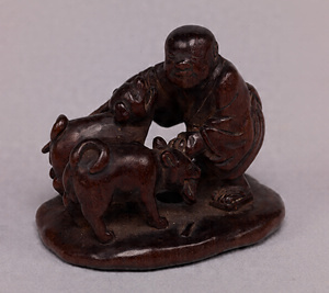 Netsuke, Dog and blind person design