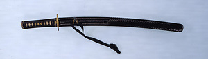 One of Two Mountings for a Pair of Swords ("Daishō"), Wooden black-lacquered scabbard with rope texture