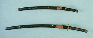 &quot;Handachi and Daishō&quot; (Pair of Long and Short Swords) Style Mounting with Silver Stream Design on Green Lacquer Ground