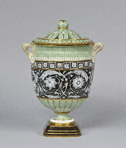 Flattened Jar Multicolor glaze, applied floral arabesque design 