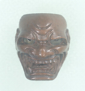 Wood Netsuke., Demon mask.