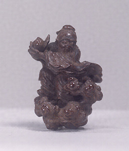 Netsuke, Design of Dongfang Shuo stealing the peaches of immortality