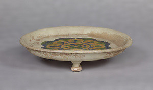 Three-legged Dish Three-color glaze with stamped lotus flower design