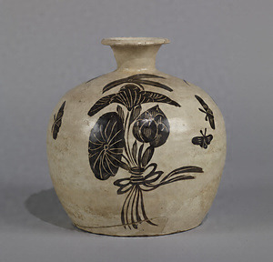 Vase Transparent glaze on white slip with lotus bouquet design in iron pigment