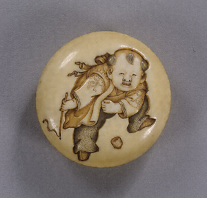 Netsuke, Design of a Chinese boy spinning a top