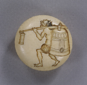 Round Netsuke, Design of a demon carrying a temple bell