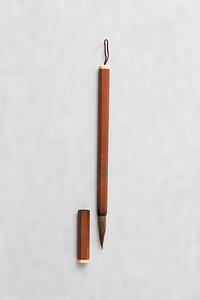 貝松泉銘六稜彫蘭石図木管筆