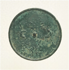 Mirror with design of flowering plants and two birds (Excavated from sutra mound at Kimpu-sen, Nara)